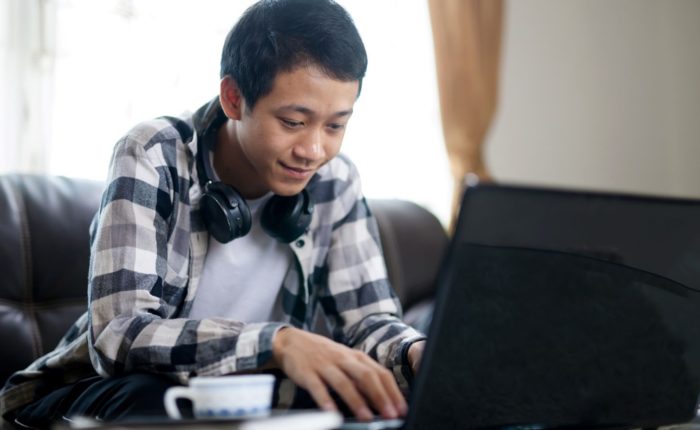 Teenage boy on laptop